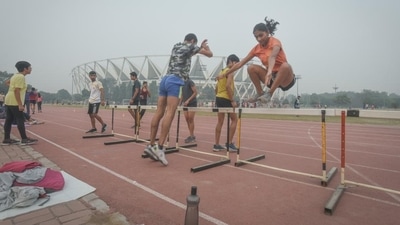 Athletes train at the Jawaharlal Nehru Stadium amid severe air pollution in New Delhi on Thursday. (Raj K Raj/ Hindustan Times) Athletes train at the Jawaharlal Nehru Stadium amid severe air pollution in New Delhi on Thursday. (Raj K Raj/ Hindustan Times)