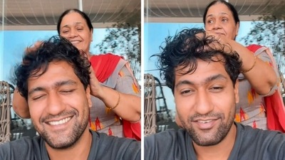 Vicky Kaushal enjoys head massage from his mother Veena Kaushal. Vicky Kaushal enjoys head massage from his mother Veena Kaushal.