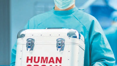 surgeon with his fresh delivery (Getty Images)