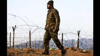 An Indian Army soldier patrols near the Line of Control in Poonch. (AP File Photo)