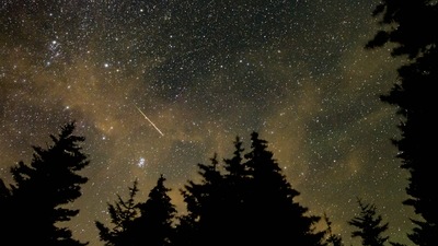 (File) This NASA handout photo shows a 30 second exposure,as a meteor streaks across the sky during the annual Perseid meteor shower in August 2021. (AFP)