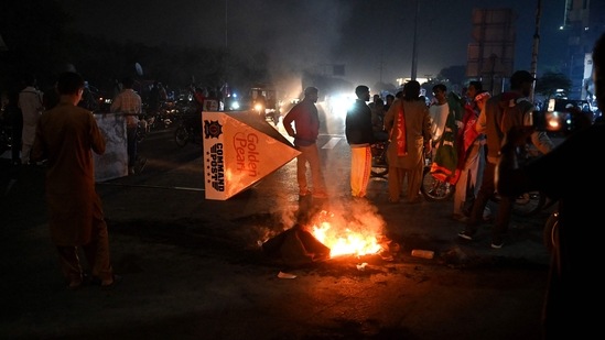 Supporters of Imran Khan take part in a protest against the assassination attempt on Khan, outside the hospital where Khan is admitted, in Lahore.(AFP) Supporters of Imran Khan take part in a protest against the assassination attempt on Khan, outside the hospital where Khan is admitted, in Lahore.(AFP)