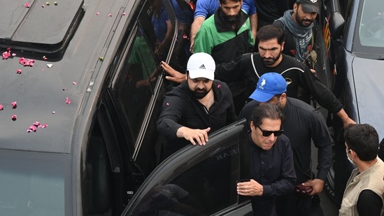 Khan was traveling in a large convoy of trucks and cars heading towards the capital, Islamabad, as part of his campaign aimed at forcing the government to hold early elections. Image from November 1.(AFP)