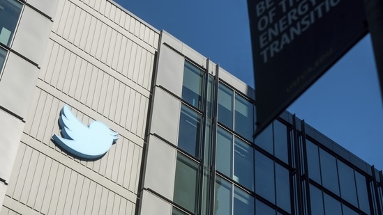 A Twitter logo hangs outside the company's San Francisco offices.(AP)
