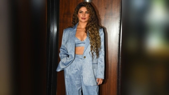 She finished off her ensemble with a gleaming pair of peep-toe heels. Her lavender ensemble has a modern twist thanks to the silver heels. Her stunning long, curly hair wonderfully complements her appearance and makes her look like a bombshell.(HT Photos/Varinder Chawla)
