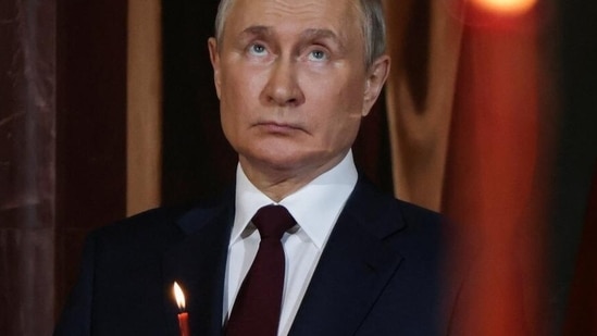 Russian President Vladimir Putin appeared weak at an Easter mass April 23(Maxim Shemetov/REUTERS) Russian President Vladimir Putin appeared weak at an Easter mass April 23(Maxim Shemetov/REUTERS)