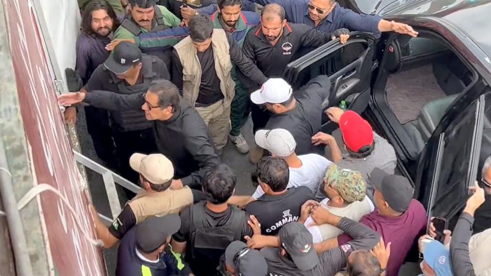 Pakistan’s former prime minister Imran Khan injured after an unidentified gunman opened fire during his protest march in Pakistan’s Punjab province. (PTI/ Video screenshot) Pakistan’s former prime minister Imran Khan injured after an unidentified gunman opened fire during his protest march in Pakistan’s Punjab province. (PTI/ Video screenshot)