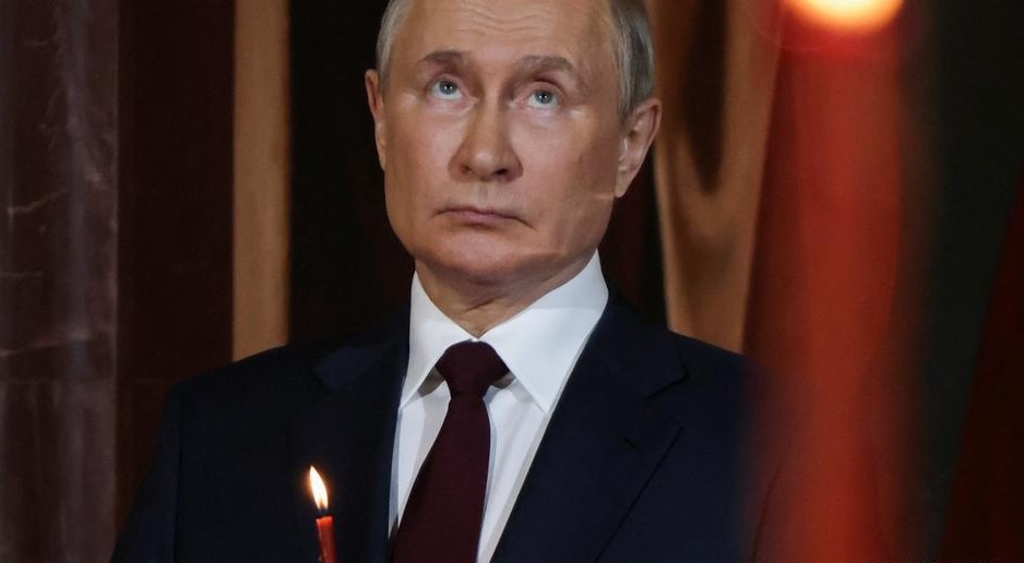 Russian President Vladimir Putin appeared weak at an Easter mass April 23(Maxim Shemetov/REUTERS)