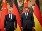Chinese President Xi Jinping (R) welcomes German Chancelor Olaf Scholz. Chinese President Xi Jinping (R) welcomes German Chancelor Olaf Scholz.