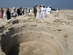 Sheikh Majid bin Saud Al Mualla, chairman of the Umm Al Quwain Department of Tourism and Archaeology, front right, explains to Noura Al Kaabi, UAE Minister of Culture and Youth, during a visit of the ancient Christian monastery on Siniyah Island in Umm al-Quwain, United Arab Emirates, November 3. Sheikh Majid bin Saud Al Mualla, chairman of the Umm Al Quwain Department of Tourism and Archaeology, front right, explains to Noura Al Kaabi, UAE Minister of Culture and Youth, during a visit of the ancient Christian monastery on Siniyah Island in Umm al-Quwain, United Arab Emirates, November 3.