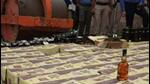 Seized liquor bottles being destroyed in Patna. (HT) Seized liquor bottles being destroyed in Patna. (HT)