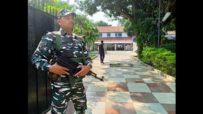 Central Reserve Police Force personnel stand guard during the raid conducted by Income Tax officials at the residence of Congress MLA Kumar Jaimangal Singh, in Ranchi on Friday. (Somnath Sen) Central Reserve Police Force personnel stand guard during the raid conducted by Income Tax officials at the residence of Congress MLA Kumar Jaimangal Singh, in Ranchi on Friday. (Somnath Sen)