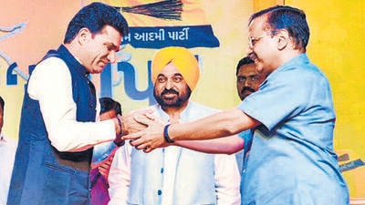 Ahmedabad, Nov 04 (ANI): Isudan Gadhvi, Chief Ministerial candidate for the upcoming Gujarat Assembly elections, being greeted by Delhi Chief Minister and Aam Aadmi Party (AAP) convenor Arvind Kejriwal after the announcement of his name as CM candidate in the presence of Punjab Chief Minister Bhagwant Mann, in Ahemdabad on Friday. (ANI Photo) (Arvind Kejriwal Twitter) Ahmedabad, Nov 04 (ANI): Isudan Gadhvi, Chief Ministerial candidate for the upcoming Gujarat Assembly elections, being greeted by Delhi Chief Minister and Aam Aadmi Party (AAP) convenor Arvind Kejriwal after the announcement of his name as CM candidate in the presence of Punjab Chief Minister Bhagwant Mann, in Ahemdabad on Friday. (ANI Photo) (Arvind Kejriwal Twitter)