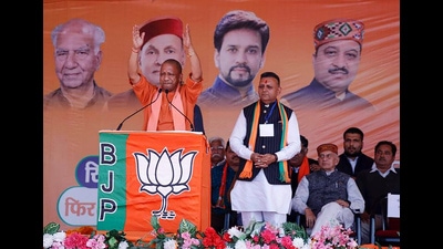 Uttar Pradesh chief minister Yogi Adityanath with BJP candidate Sanjay Guleria at Jawali in Kangra on Friday. (ANI) Uttar Pradesh chief minister Yogi Adityanath with BJP candidate Sanjay Guleria at Jawali in Kangra on Friday. (ANI)