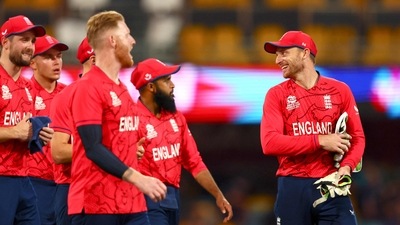 England's Captain Jos Buttler (R) shares the laugh with teammates England's Captain Jos Buttler (R) shares the laugh with teammates