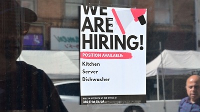 US Economy: A "We Are Hiring" sign is posted in front of a restaurant in Los Angeles, California. (AFP) US Economy: A "We Are Hiring" sign is posted in front of a restaurant in Los Angeles, California. (AFP)