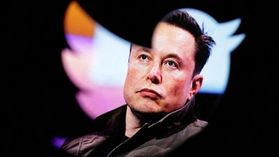 FILE PHOTO: FILE PHOTO: Elon Musk's photo is seen through a Twitter logo in this illustration taken October 28, 2022. REUTERS/Dado Ruvic/Illustration/File Photo/File Photo (REUTERS)