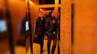 In another set of photos shared on Kareena Kapoor's Instagram handle, she was seen wearing an animal print jacket with knee-high boots (Instagram/@kareenakapoorkhan) In another set of photos shared on Kareena Kapoor's Instagram handle, she was seen wearing an animal print jacket with knee-high boots (Instagram/@kareenakapoorkhan)