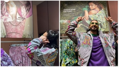 Ranveer Singh going crazy over Deepika Padukone's poster at a store. Ranveer Singh going crazy over Deepika Padukone's poster at a store.