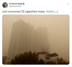 Delhi smog covers a building. (Twitter/@drriteshmalik)