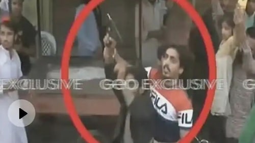 The attacker who shot Imran Khan is spotted in this screengrab shared by Geo News (Geo News) The attacker who shot Imran Khan is spotted in this screengrab shared by Geo News (Geo News)