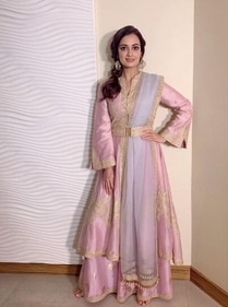 You can take inspiration from Dia Mirza's outfit as she styled her A-line kurta by adding a detailed belt to her plain dupatta. (Instagram/@Diamirza) You can take inspiration from Dia Mirza's outfit as she styled her A-line kurta by adding a detailed belt to her plain dupatta. (Instagram/@Diamirza)