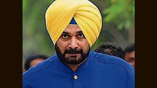 Serving a term in the Patiala jail after being convicted in a road rage case of 1988 in which one person died, Congress leader Navjot Singh Sidhu appeared in a Ludhiana court through video conferencing after he has been summoned as a witness in a criminal complaint case filed against Congress ex-minister Bharat Bhushan Ashu in Ludhiana CLU scam. (HT File Photo)