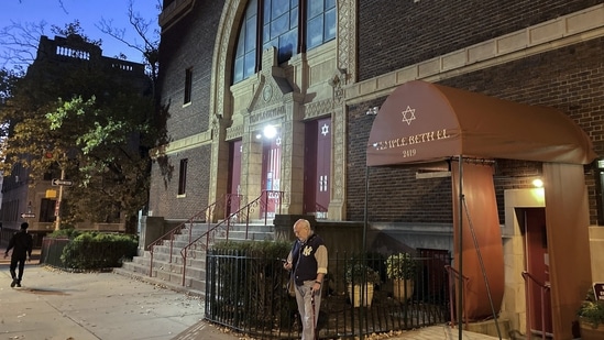 A man stands outside Temple Beth El synagogue, Thursday in Jersey City, N.J.(AP)