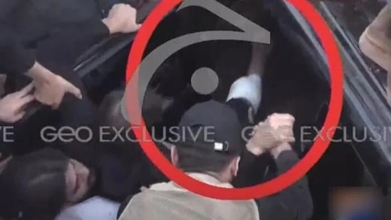 Former Pakistan prime minister Imran Khan's bandaged shin is seen in this screengrab shared by Geo News (Geo News)