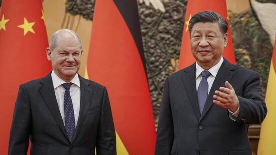 German Chancellor Olaf Scholz (left) meets Chinese President Xi Jinping at the Great Hall of People in Beijing, China, on Friday. (AP)