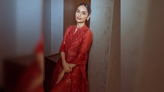 Manushi Chhillar kept it simple yet traditional in this red salwar suit from the collection of designer Archana Jaju.(Instagram/@manushi_chhillar)