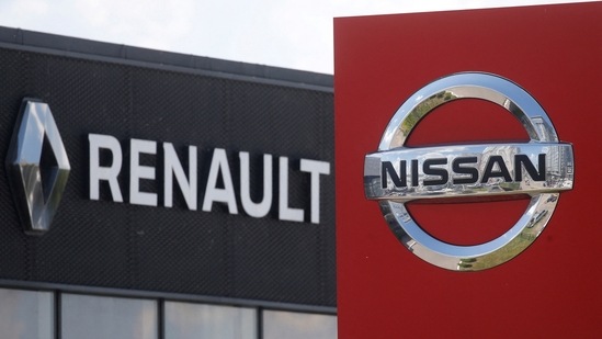 The logos of car manufacturers Nissan and Renault are pictured at a dealership.(REUTERS)