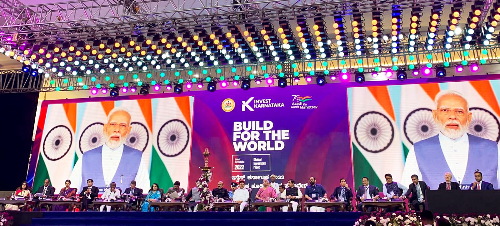 Union Ministers Nirmala Sitharaman, Piyush Goyal and Pralhad Joshi with Union Minister of State for Entrepreneurship Rajeev Chandrasekhar, Karnataka Governor Thaawarchand Gehlot and State Chief Minister Basavaraj Bommai listens to Prime Minister Narendra Modi virtually addresses the inaugural function of Invest Karnataka 2022, the Global Investors Meet of the state, in Bengaluru on Wednesday. (NSitharamanOffice twitter) Union Ministers Nirmala Sitharaman, Piyush Goyal and Pralhad Joshi with Union Minister of State for Entrepreneurship Rajeev Chandrasekhar, Karnataka Governor Thaawarchand Gehlot and State Chief Minister Basavaraj Bommai listens to Prime Minister Narendra Modi virtually addresses the inaugural function of Invest Karnataka 2022, the Global Investors Meet of the state, in Bengaluru on Wednesday. (NSitharamanOffice twitter)