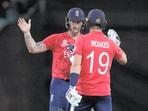 Ben Stokes and Chris Woakes saw England over the line as they beat Sri Lanka by four wickets to secure a spot in the semi-finals of the T20 World Cup(AP)