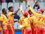 Zimbabwe players celebrate the dismissal of Netherlands' Colin Ackermann during the T20 World Cup cricket match between the Netherlands and Zimbabwe in Adelaide.(AP) Zimbabwe players celebrate the dismissal of Netherlands' Colin Ackermann during the T20 World Cup cricket match between the Netherlands and Zimbabwe in Adelaide.(AP)