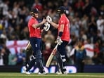 Ben Stokes (L) with Chris Woakes after the win