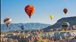 The early morning hot air balloon ride in Cappadocia takes you up in the air for about one hour, and offers a view of the region’s unique rock formations The early morning hot air balloon ride in Cappadocia takes you up in the air for about one hour, and offers a view of the region’s unique rock formations