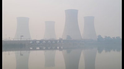 Thick smog surrounding a power plant in Bathinda, Punjab, on Friday. (Sanjeev Kumar/HT) Thick smog surrounding a power plant in Bathinda, Punjab, on Friday. (Sanjeev Kumar/HT)