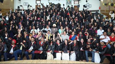 Students in a jubilant mood after the degree-awarding ceremony at Panjab University. (HT Photo)