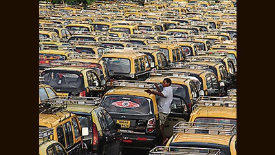 Mumbai, India - 2 Sept. 2015 : The black and yellow taxi observes strike against uber and ola cabs, The strike continues for the second day. All the taxi drivers line up at CST international airport, Andheri, in Mumbai, India, on Wednesday, September 2, 2015. (Photo by Pramod Thakur/ Hindustan Times) (Hindustan Times)