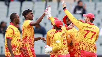 Zimbabwe players celebrate the dismissal of Netherlands' Colin Ackermann during the T20 World Cup cricket match between the Netherlands and Zimbabwe in Adelaide. (AP) Zimbabwe players celebrate the dismissal of Netherlands' Colin Ackermann during the T20 World Cup cricket match between the Netherlands and Zimbabwe in Adelaide. (AP)