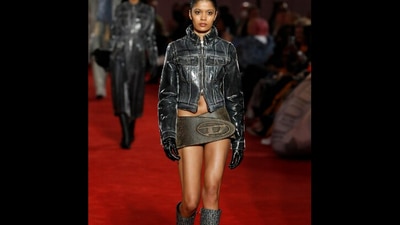 Diesel's model in their belt skirt. (Twitter/@justafewmorelbs) Diesel's model in their belt skirt. (Twitter/@justafewmorelbs)
