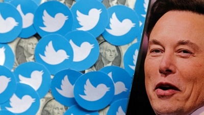 FILE PHOTO: Elon Musk photo, Twitter logos and U.S. dollar banknotes are seen in this illustration, August 10, 2022. REUTERS/Dado Ruvic/Illustration/File Photo (REUTERS)