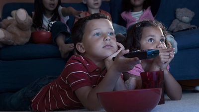 Sitting too close to the TV: This is a sign that your child might be nearsighted. Bringing an object closer to the face makes an image bigger and clearer. (Gettyimages) Sitting too close to the TV: This is a sign that your child might be nearsighted. Bringing an object closer to the face makes an image bigger and clearer. (Gettyimages)