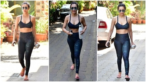 Malaika Arora wears a black printed sports bra and yoga pants for workout. (HT Photo/Varinder Chawla)