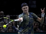 Holger Rune from Denmark returns the ball to Felix Auger-Aliassime of Canada during their semi final match of the Paris Masters tennis tournament at the Accor Arena in Paris, Saturday, Nov. 5, 2022. (AP) Holger Rune from Denmark returns the ball to Felix Auger-Aliassime of Canada during their semi final match of the Paris Masters tennis tournament at the Accor Arena in Paris, Saturday, Nov. 5, 2022. (AP)