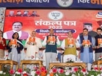 Shimla: BJP National President J.P. Nadda along with Union Minister Anurag Thakur, Himachal Pradesh Chief Minister Jai Ram Thakur and others releases BJP's manifesto for the upcoming Himachal Pradesh Assembly elections, in Shimla, Sunday, Nov. 6, 2022. (PTI Photo)(PTI11_06_2022_000041A)(PTI)