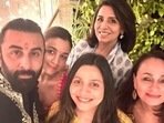 Ranbir Kapoor and Alia Bhatt with their family during a recent celebration (left). Ranbir and Alia's baby announcement (right). Ranbir Kapoor and Alia Bhatt with their family during a recent celebration (left). Ranbir and Alia's baby announcement (right).