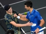 Denmark's Holger Rune (L) is congratulated by Serbia's Novak Djokovic after winning his men's singles final tennis match against Serbia's Novak Djokovic