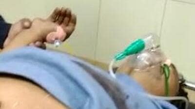 The victim, Omprakash, 52, suffered a bullet wound in the stomach. He remains critical at PGIMER, Chandigarh. Before fleeing, the robbers locked the liquor vend’s shutter from outside, leaving the Omprakash bleeding inside. Help arrived only the next morning. (HT Photo) The victim, Omprakash, 52, suffered a bullet wound in the stomach. He remains critical at PGIMER, Chandigarh. Before fleeing, the robbers locked the liquor vend’s shutter from outside, leaving the Omprakash bleeding inside. Help arrived only the next morning. (HT Photo)